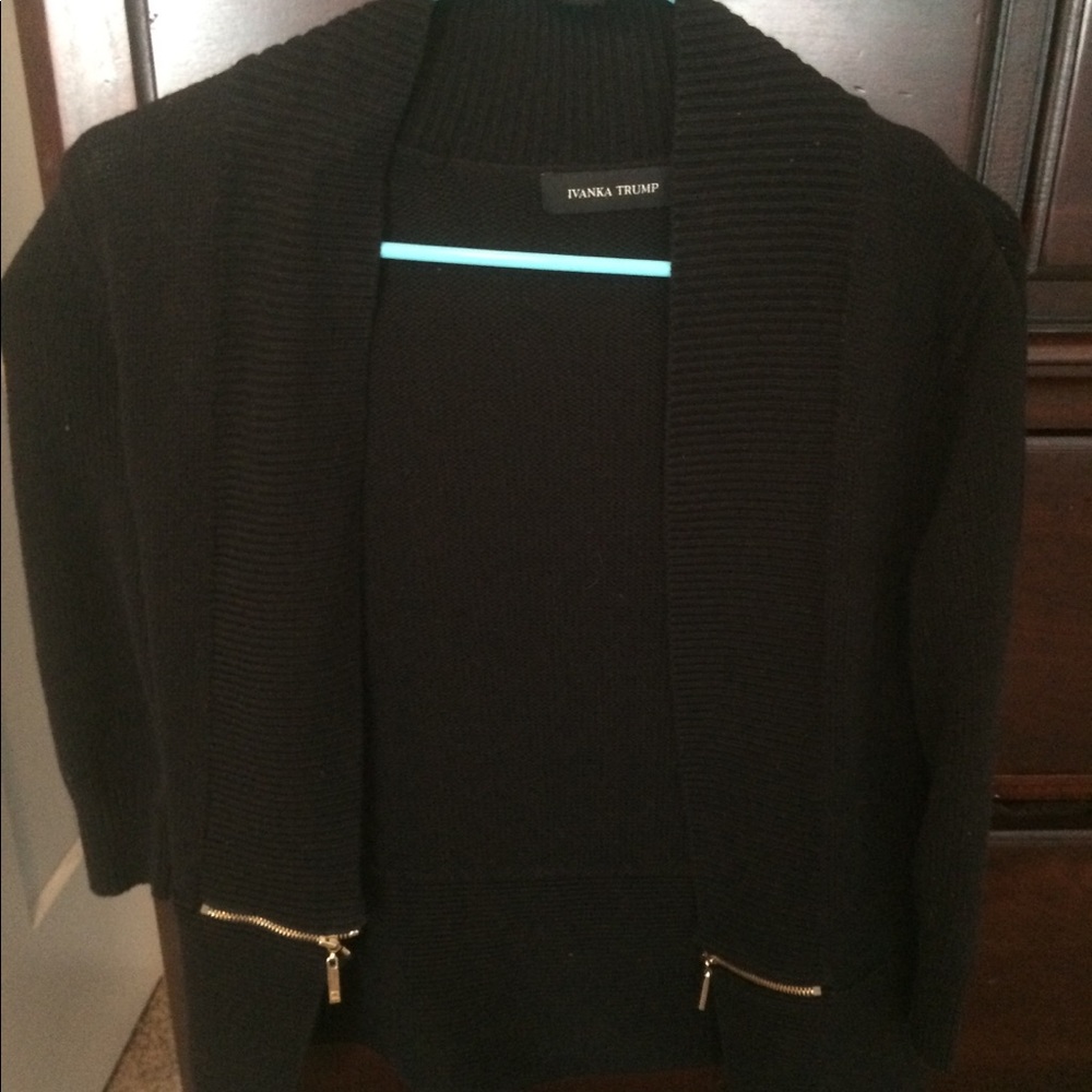 Black sweater with gold zippers